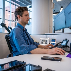 Person working on a desktop computer